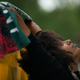 A woman holds up a tapestry that says “Black Lives Matter” on the steps of the Minnesota Capitol on June 16, 2017, in St Paul after Officer Jeronimo Yanez was acquitted on all counts in the shooting death of Philando Castile. (Stephen Maturen/Getty Images)